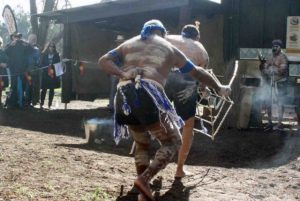 3 Aboriginal men performing a ceremonial dance at the John Masters Bird Hide 2013 opening